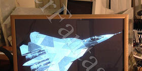 Изготовление индивидуального заказа картины с подсветкой и гравировкой: 600х400х8мм. Фотография самолёта Т50.