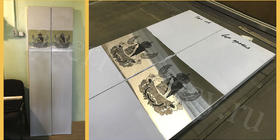 Металлические двери лифта с лазерной гравировкой герба.